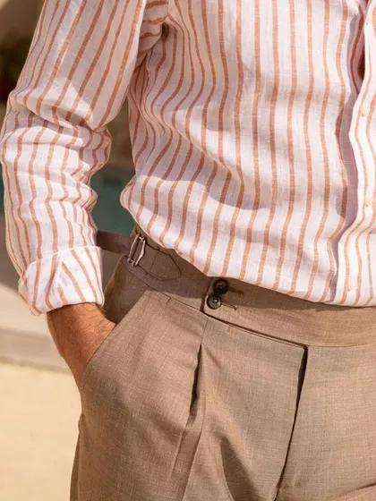 The same relaxed yet refined look, showcasing how a well-fitted linen shirt and tailored trousers can be both comfortable and incredibly stylish.