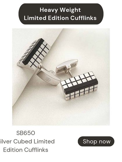 These silver cubed limited edition cufflinks have a modern, geometric design. The contrast between the polished silver and the black inlay makes them a stylish and contemporary choice.