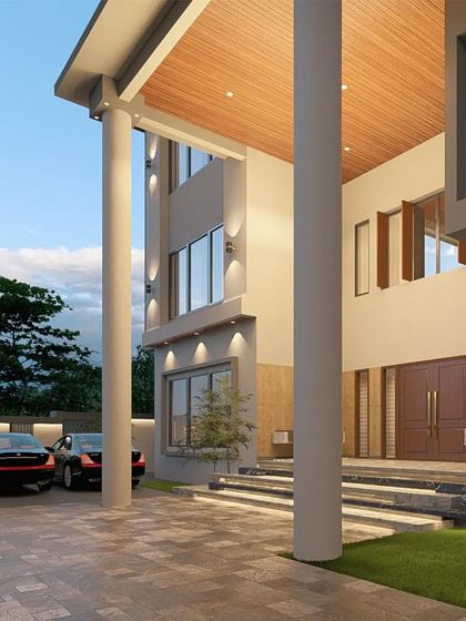 The entrance of "The Honest House" features a serene Buddha statue and carefully planned landscaping, creating a tranquil transition from the outside world into this modern sanctuary.