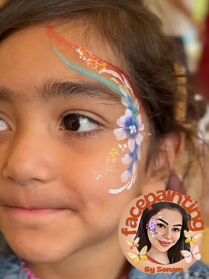 A beautiful floral design with a rainbow accent. The glitter makes it extra special.