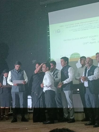 Awarding certificates to the participants. Recognizing their effort is important to encourage them on their legal journey.