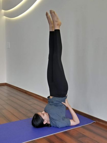 Salamba Sarvangasana (Shoulder Stand) is known as the queen of asanas for its many benefits, from calming the nervous system to improving circulation.