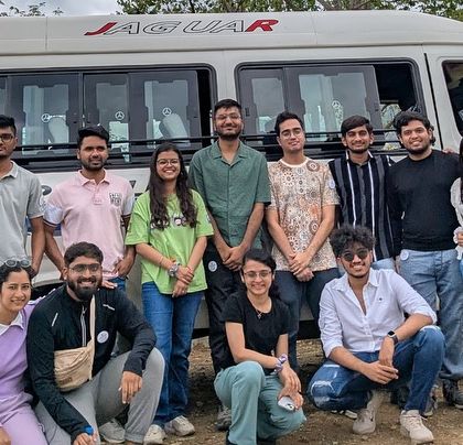 Our group posing in front of our tempo traveller during a trip to Hogenakkal Falls.