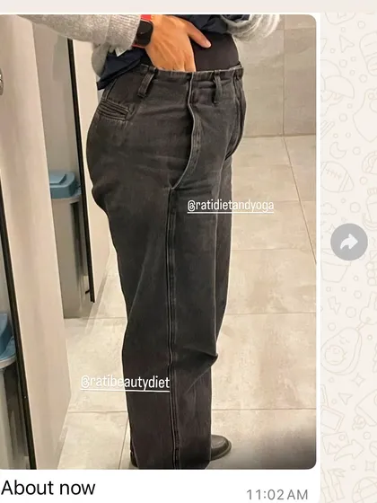 Nikita's "after" photo, showing how comfortably the jeans fit now.