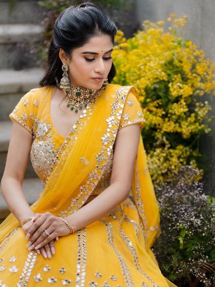 A serene and beautiful portrait. The soft makeup and elegant hairstyle create a timeless and graceful look.