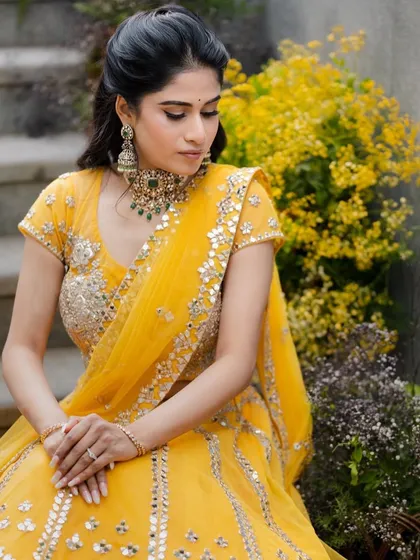 A serene and beautiful portrait. The soft makeup and elegant hairstyle create a timeless and graceful look.