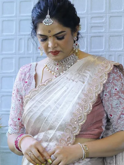 Photos from my housewarming, wearing a saree and blouse I designed myself. I took a plain tissue saree and completely transformed it with a hand-worked scalloped border and a custom-stitched velvet blouse. It’s a look that’s very close to my heart.