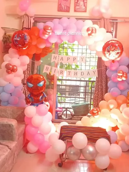 A simple yet fun Spiderman-themed birthday decoration for a home party.