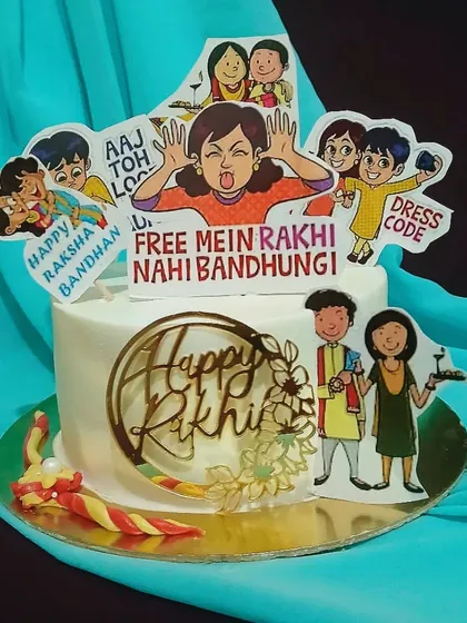 A fun and quirky Rakhi cake for a sister. This cake is decorated with funny cartoon toppers that capture the playful bond between siblings, along with a 'Happy Rakhi' plaque.