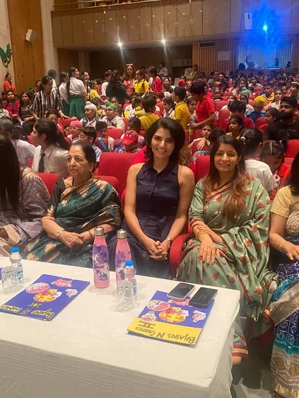 Seated on the judging panel, ready to watch the students perform. It's inspiring to see the energy and creativity they bring to the stage.