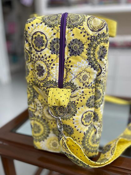 A close-up of the travel bag's hardware and strap attachment, demonstrating the quality and durability of our construction.