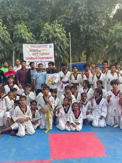 Our team celebrating their medal haul at the DDA Taekwondo Championship.