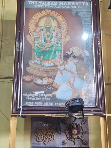 A painting at the Kalikambal temple in Chennai, depicting Chhatrapati Shivaji Maharaj at the feet of the Divine Mother. A powerful representation of the union of Kshatra and Bhakti.