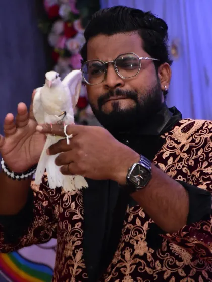 A quiet moment with one of my co-stars. Working with doves requires gentleness and precision, and they help create some of the most beautiful moments in my magic show.