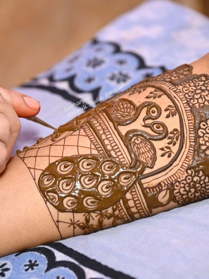 The art of filling. This shot shows how I build up a design layer by layer, a technique I teach to create depth and richness in patterns like this peacock motif.