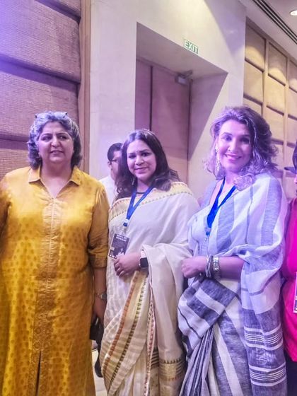 Networking with fellow panelists and attendees at the "Boss Lady Spotlight" event. These connections with other women leaders are vital for building a strong support ecosystem.