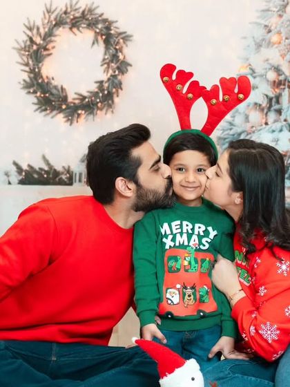 A perfect family Christmas card photo. The whole family gets cozy in their festive sweaters for our holiday mini session.