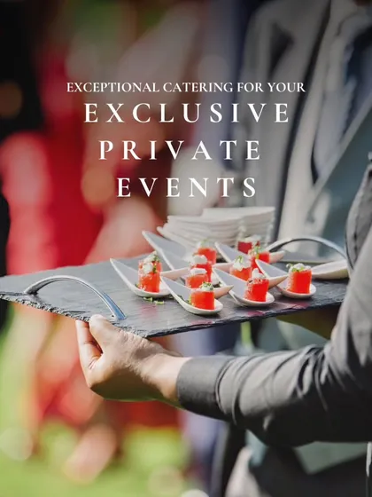 Exceptional catering for your exclusive private events. A server offers elegant canapés, underscoring our specialization in providing personalized and high-end services for any occasion.