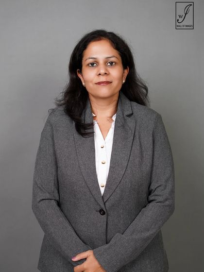 A straight-on portrait that is clean, direct, and professional, suitable for any corporate use.