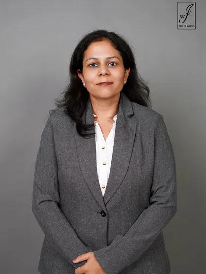 A straight-on portrait that is clean, direct, and professional, suitable for any corporate use.