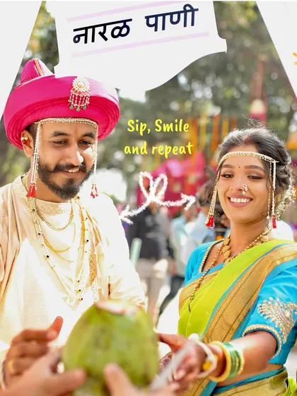 A happy couple enjoys fresh coconut water at their Maharashtrian wedding. My 'Nariyal Pani' cart adds a traditional and refreshing element that everyone loves.