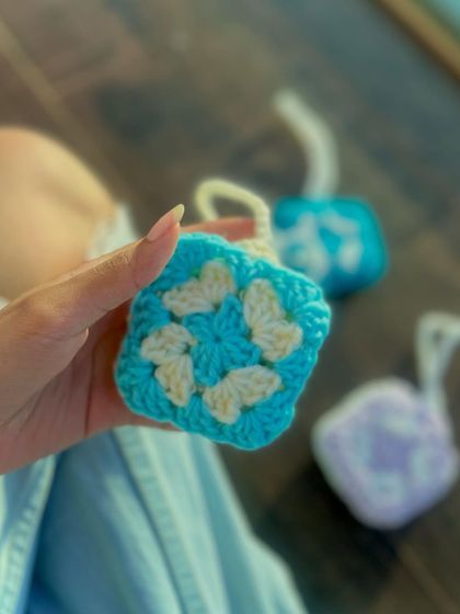 Another view of the butterfly pouch, this time in a light blue with cream butterflies. Each one is handmade, so you get a unique piece every time.