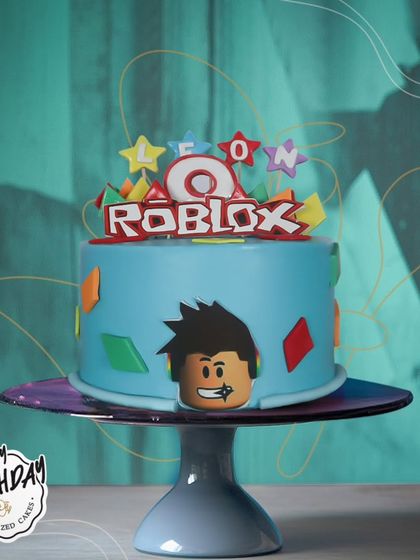 Level up your birthday with this awesome Roblox cake. The design features a character avatar and colorful game elements, perfect for a young gamer's celebration.