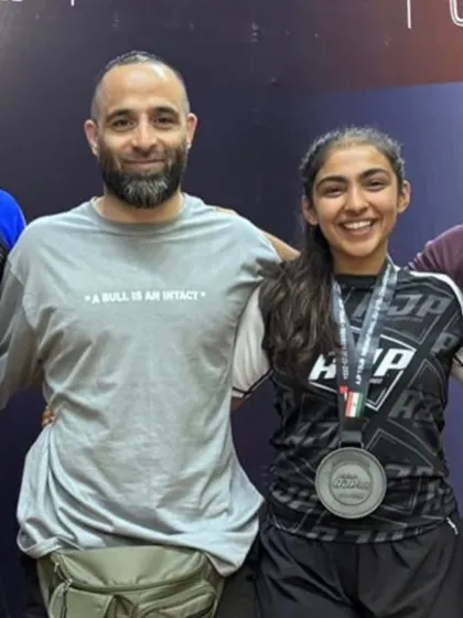 I train everyone with the same intensity. Here I am with Yusra, a multiple-time National MMA and Grappling Champion. We build strong fighters, men and women.
