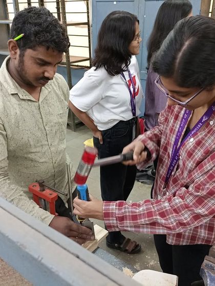 A student learns how to use a chisel to clean out a mortise, a classic and essential woodworking joint.