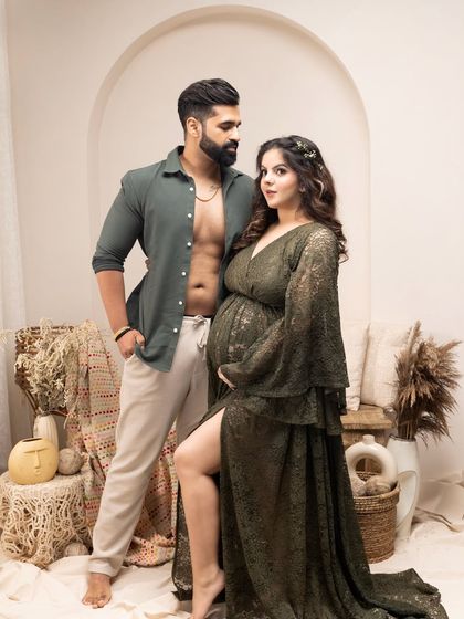 Love, anticipation, and style, all captured in one perfect frame. This boho-themed shot shows the couple's connection and excitement.