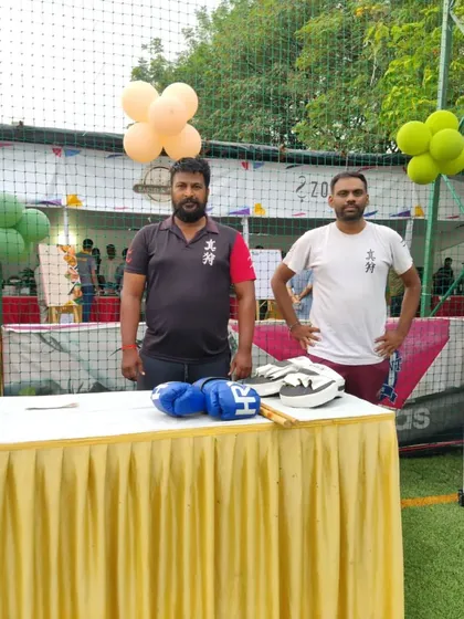 My team and I at our Fighting Fit stall. We enjoy getting out in the community to spread awareness about practical self-defense and fitness.