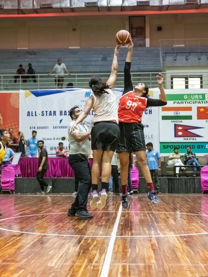 The tip-off at the All-Star Basketball Charity Match. We host events that bring together top players for high-stakes games, giving our trainees exposure to top-tier competition.