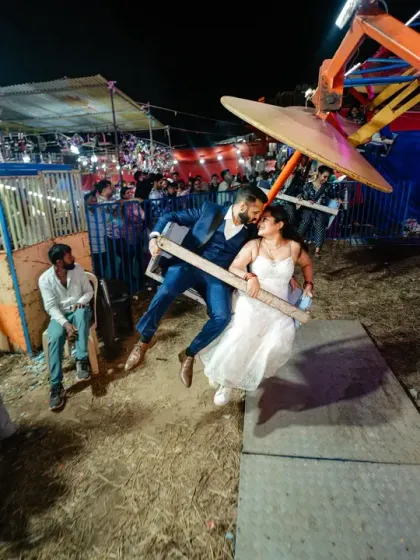 Who says you can't go to a funfair on your wedding day? This spontaneous shot on a ride captures the couple's adventurous and fun-loving spirit. We can make your shoot anything you want it to be.