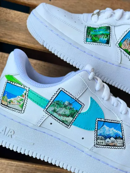 A different angle of the custom travel-themed Nike Air Force 1s.