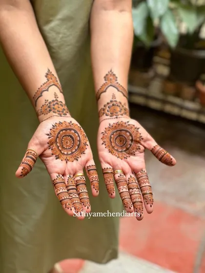 Sometimes, elegance lies in simplicity. This beautiful mandala design is perfect for guests, bridesmaids, or for any occasion where you want a touch of traditional art that is both striking and minimalist.