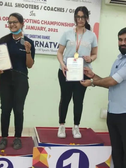 Awarding medals to the winners at the Purntva Open Shooting Championship. So proud to see my students excel.