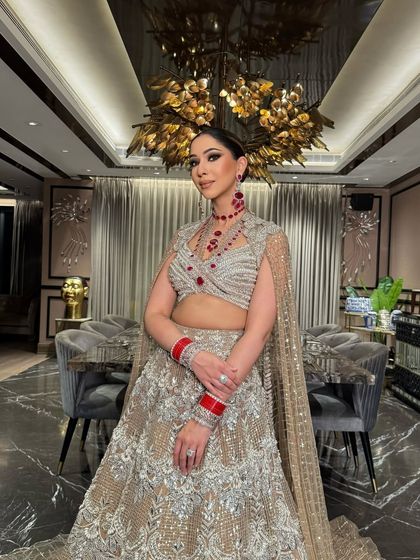 The complete ensemble, exuding luxury and sophistication. The makeup ties everything together, creating a look of pure elegance.