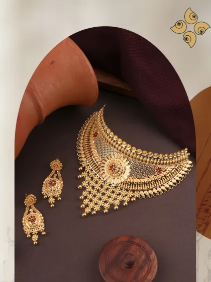 Shine bright with our gorgeous yellow choker necklace collection. This piece features a classic, wide design with red enamel work, adding a pop of colour and traditional charm.