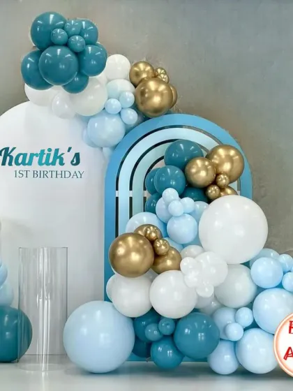 A still shot of the stylish blue and gold first birthday decor, perfect for a modern celebration.