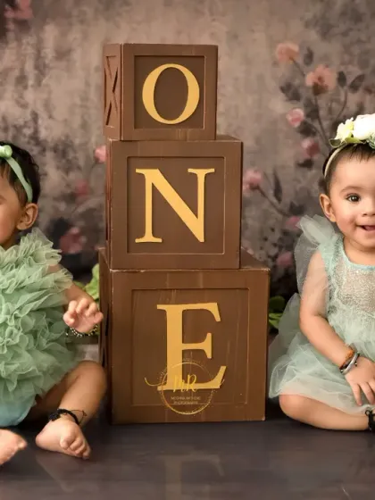 An adorable first birthday photoshoot for twin baby girls. I have experience and setups perfect for capturing the special bond between twins and siblings.