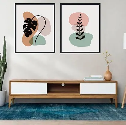 A set of two framed prints that combines abstract shapes with minimalist botanical drawings. The earthy tones and simple forms are perfect for a modern, nature-inspired decor scheme.
