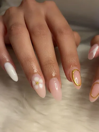 A close-up of the 3D flower and gold chrome outline detail.