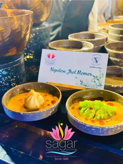 I offer specialized global dishes like these authentic Nepalese Jhol Momos. Each momo is served in a warm, tangy, and spiced broth, providing a comforting and flavorful experience.
