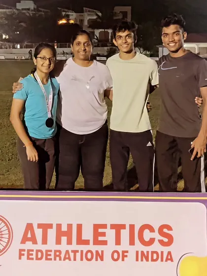 A picture with my athletes Eekisha, Yash, and Gagan after their successful performances at the 5th Indian Open 400m Competition.