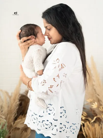 Nose to nose with her new baby. This is such an intimate and precious moment, capturing the instant bond between a mother and her child.