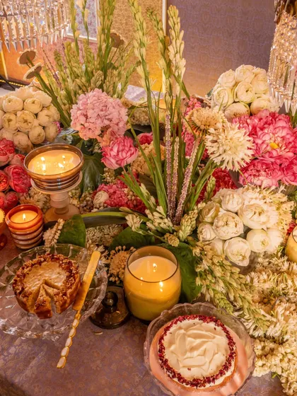 Decadent desserts, fragrant candles, and lush florals. This image from our 'Rituals' collaboration captures the essence of a truly magical Diwali celebration, where every detail is a treat for the senses.
