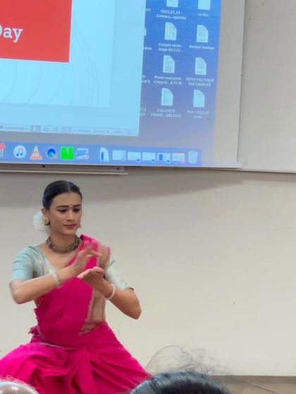 Another shot from my performance, demonstrating a mudra to the audience. These collaborations help bridge cultural and linguistic divides.