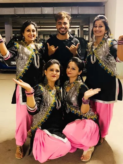 Here I am with my rocking ladies after their fantastic performance for a Durga Pooja event. I love creating group choreography for festivals that is full of energy and makes everyone feel like a star.