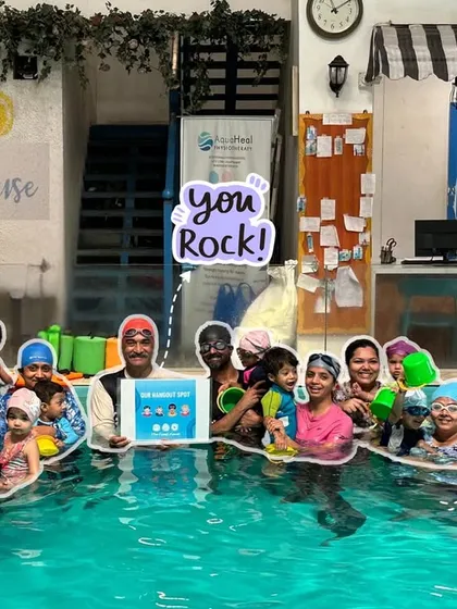 A happy group enjoying a swim session. Our pool is a community hub for swimming, smiling, and soaking up the fun.