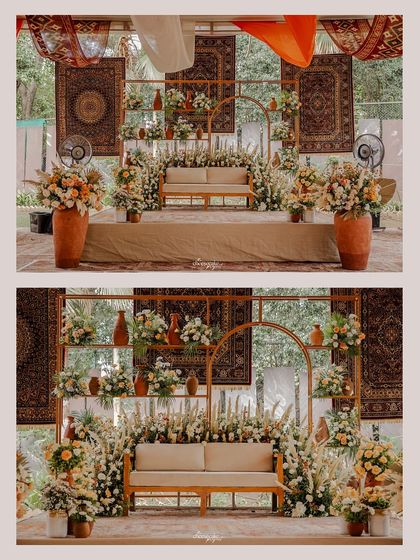 A beautiful and rustic decor setup for a carnival event, featuring earthy tones, pampas grass, and traditional carpets.